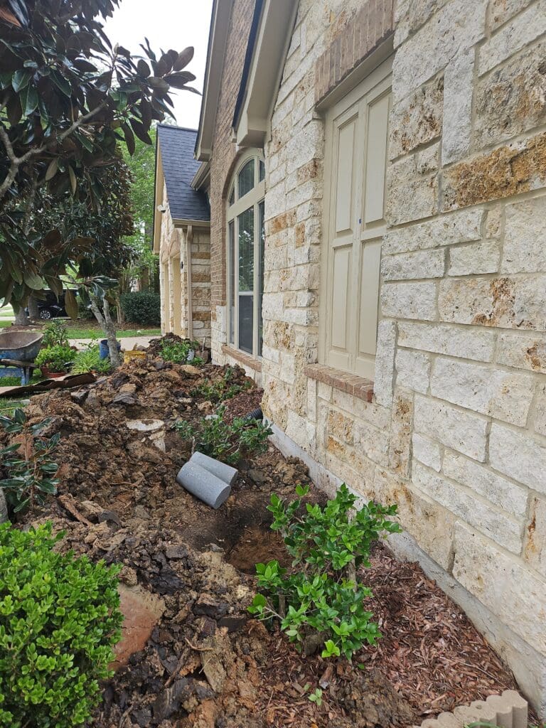 Deep Rock Foundations carefully preserves your landscaping when digging exterior holes for perimeter pilings foundation repairs in Pearland.