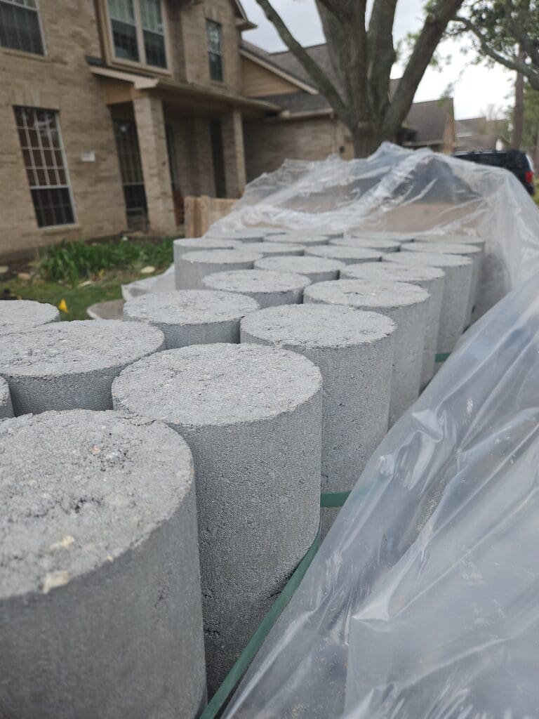 Reinforced concrete pilings prepared for a foundation repair in Pearland, Texas